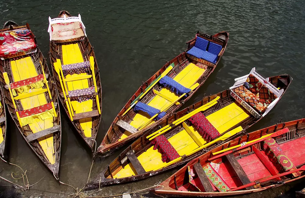 Vibrant colors of the moored boats the lake side entices you for taking a boat ride. Pic: Anilbisht 