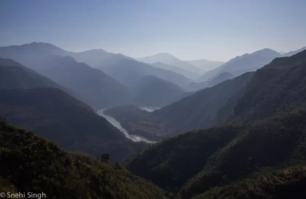 Taken during the early winter morning of Rishikesh, this picture represents the age, the history, the layers of the scape. We can spot the holy river Ganga between these mighty cliffs.. Pic: Snehy Singh 