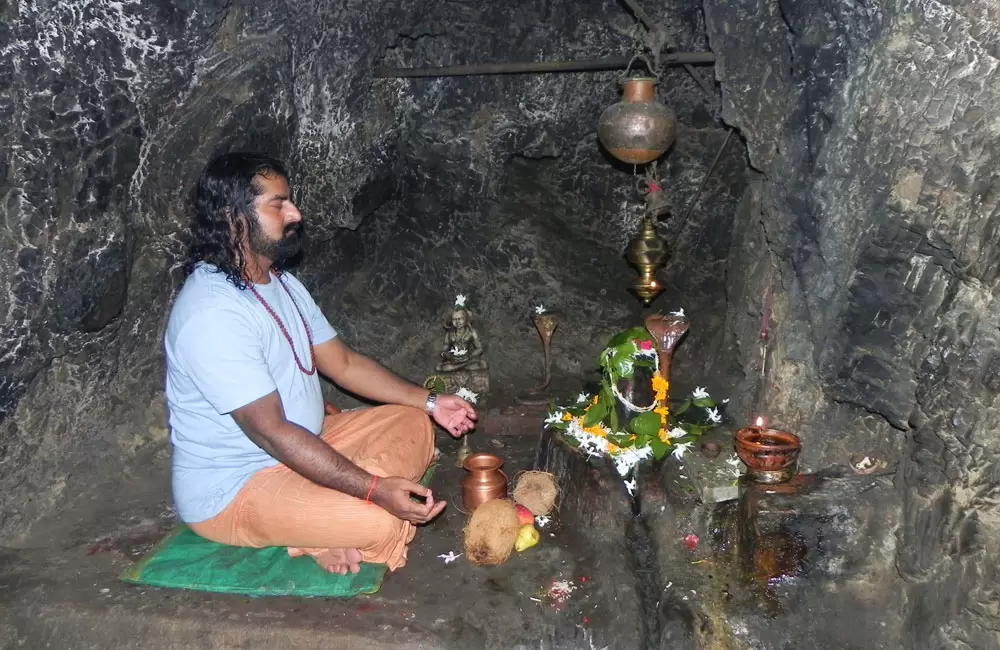 Devotee doing meditation at Vashistha Cave, Rishikesh . Pic: mohansuniverse.wordpress.com