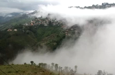 Clouds engulfing Almora city. 