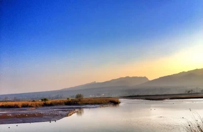 Asan Barrage- this photo depicts the modernised Uttarakhand, still maintaining itâ€™s originality. A dam, symbol of a developing Uttarakhand, at the backdrop of beautiful Himalayas-the sole of and heritage of the Uttarakhand.
