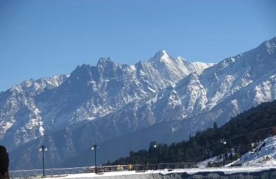 Snow capped peak as seen from Auli and Artificial lake in the foreground 