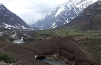 Alakananda river flowing through a glacier bridge at Badhrinath