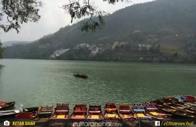 View of Bhimtal lake with beautiful colourful boats.