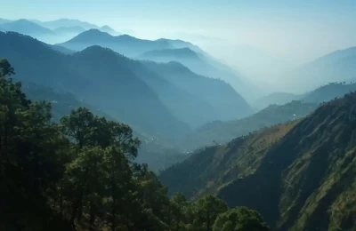 Dense green mountains view from Bhimtal road.
