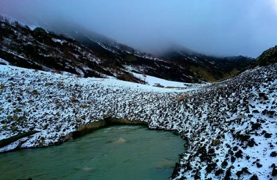 Natural bridge made from glacier above the Bhagirathi River in Bhojvasa, GaumukhTrack.