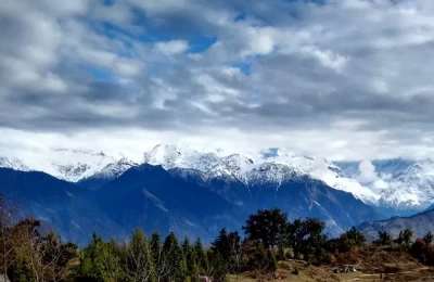This photo was clicked early morning near Deoriya Tal. The morning showers made way for clouds and ice covered peaks. Always fills you with gratitude, isnâ€™t it?