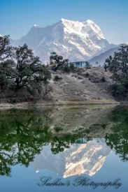Reflection of Chaukhamba peak on Deoria Tal.