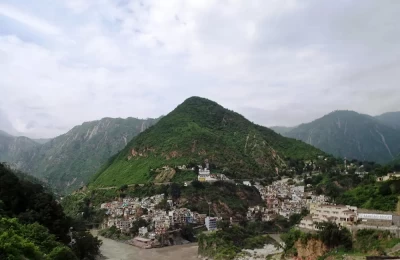 The confluence at Devprayag and rising hill piercing the sky