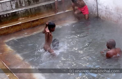 Children enjoying hot water bath