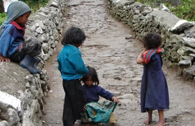 Local children playing on the main payment