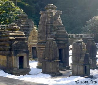 Jageshwar temple complex has temples dating 9th to 13th century AD. The main temple complex amidst dense Oak forest, is pictured here adorned with snow.