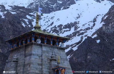 Dome of  Shri kedarnath temple & snow capped mountains view in the backdrop. May 2019.