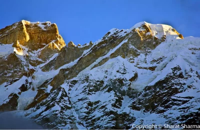 The Kedar peak during the sunrise turns golden.
