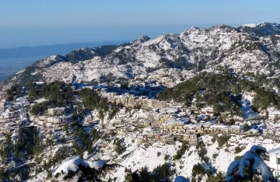 Mussoorie with snow blanket from Landaur