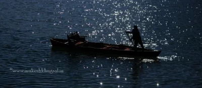 Boatsman on Naini Lake, Nainital.