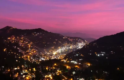 Amazing night view of Nainital city with pink clouds, view from Camel's Back, Nainital
