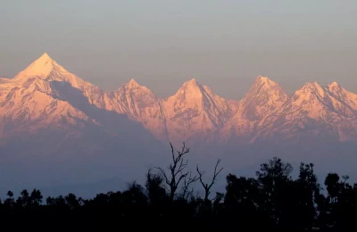 Five peaks of majestic Panchchuli massif are blazed during spectacular and mind-blowing sunset as captured from Munsiyari of Kumaon