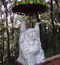 Laughing Buddha statue is seen as you enter the premises