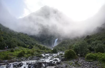 Gushing small river stream & a waterfall on the way to valley of flower.