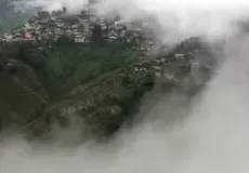 Clouds engulfing Almora city. 