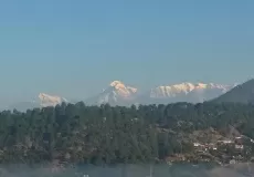 Snow clad view of Almighty Himalayas as seen from Almora..