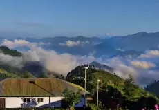 GMVN, Khirsu in the foreground and breathtaking view of Mighty Himalayas in the backdrop.