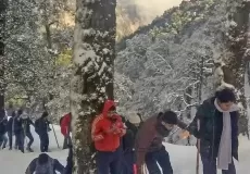 Group Hiking on Nag Tibba Trek during winters