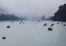 Tourist enjoying boating at Naini lake in Nainital