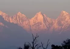 Five peaks of majestic Panchchuli massif are blazed during spectacular and mind-blowing sunset as captured from Munsiyari of Kumaon