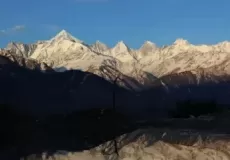Stunning view of Panchchuli peaks and its beautiful reflection in water.