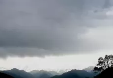 Scenic view of clouds over snow capped mountains from Kakola, Rudraprayag.