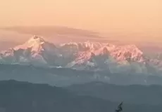 The crimson hues of setting sun over the Himalayas as seen from Shitlakhet.
शीतलाखेत अल्मोड़ा से दीखता हिमालय की चोटियों का शाम का नजारा.