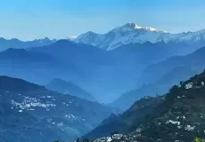 A beautiful view of both Ukhimath and Guptkashi towns.The backdrop is the mighty Kedarnath and the surrounding mountain ranges. This photo depicts the soul of Uttarakhand â€“ green landscape, vast stretch of Himalayan ranges, beautiful and simple townships, great religious power and peaceful atmosphere.