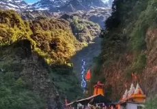 Side view of Yamunotri Dham with Snow Peaks at the back